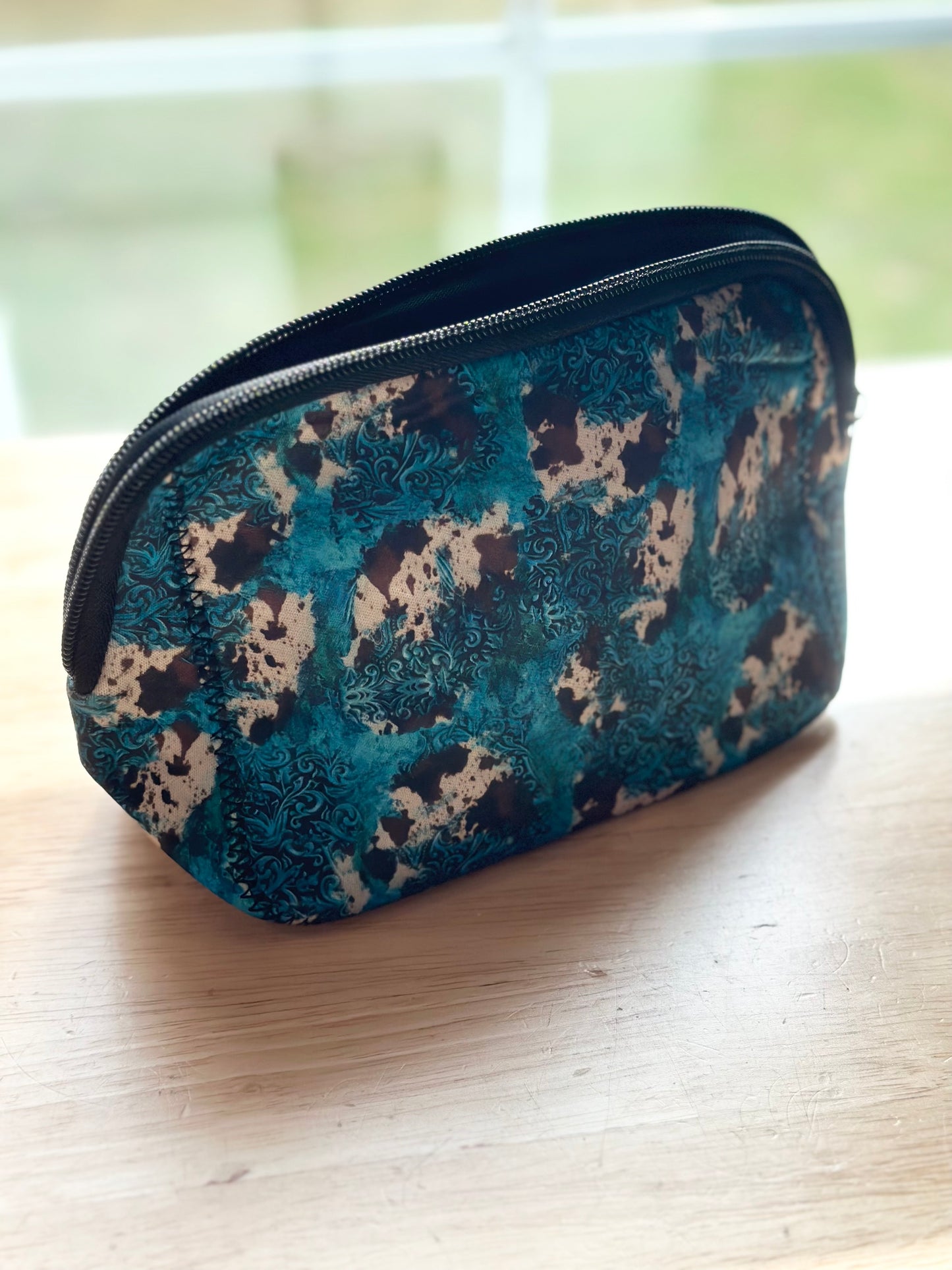 Turquoise Cow Cosmetic Bag